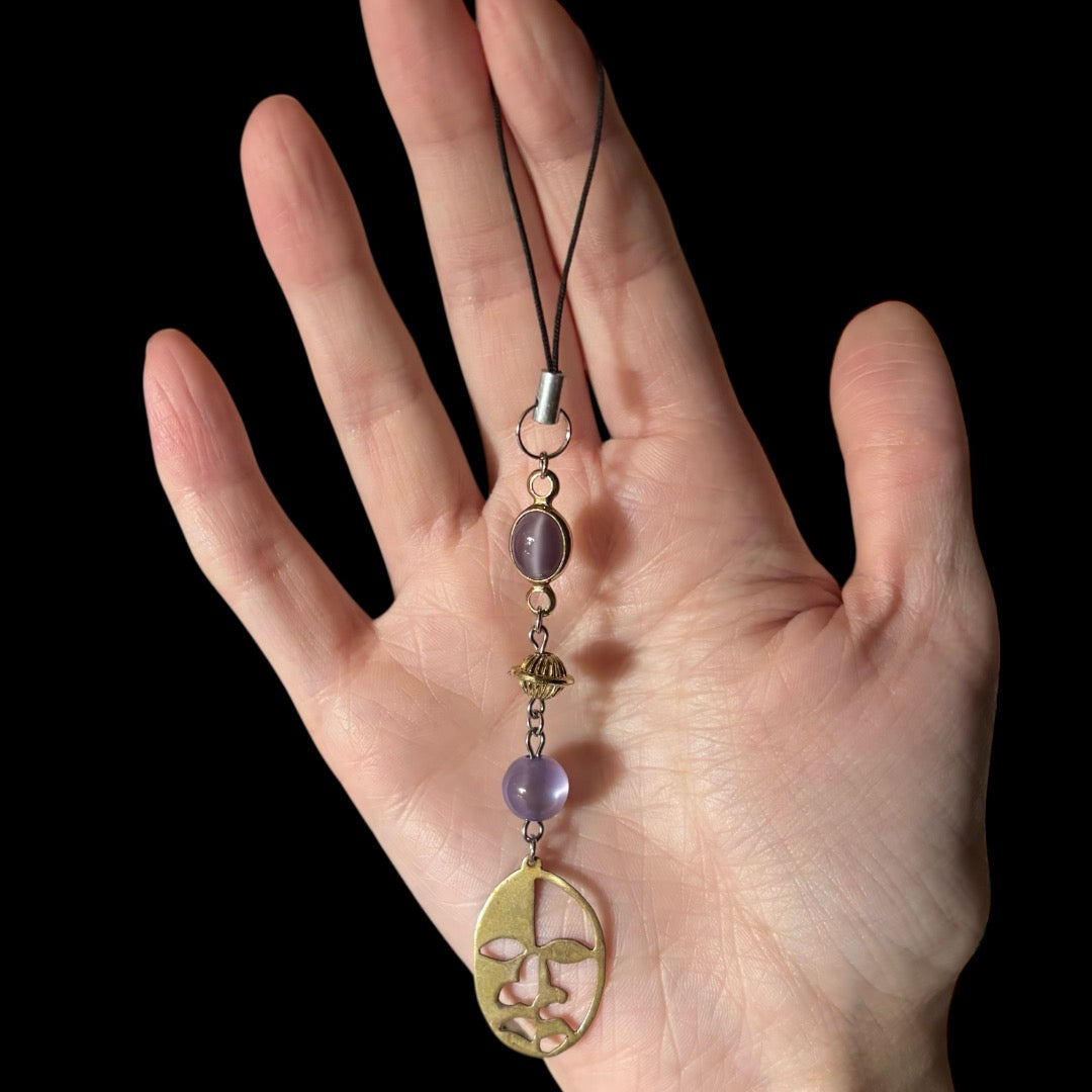 Two-Faced Phone Charm